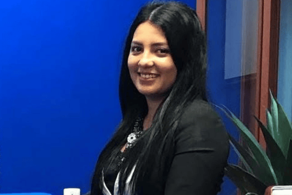 Jasmine Rivera, General Manager of Natural Hands Massage Therapy Clinic, in a professional setting.